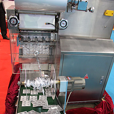 Packaging machine for tablets, Contour packaging, blister, Packaging tablets in foil www.Minipress.ru