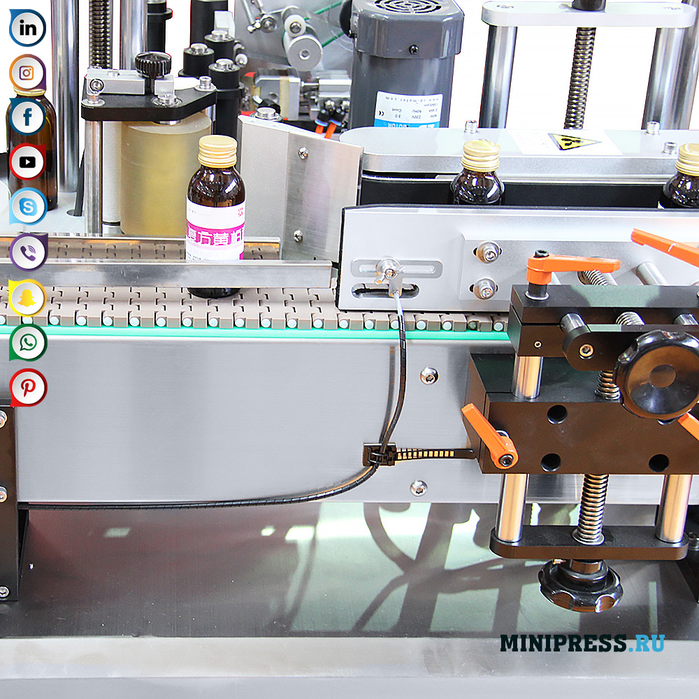 Makinë për etiketimin e shisheve të qelqit