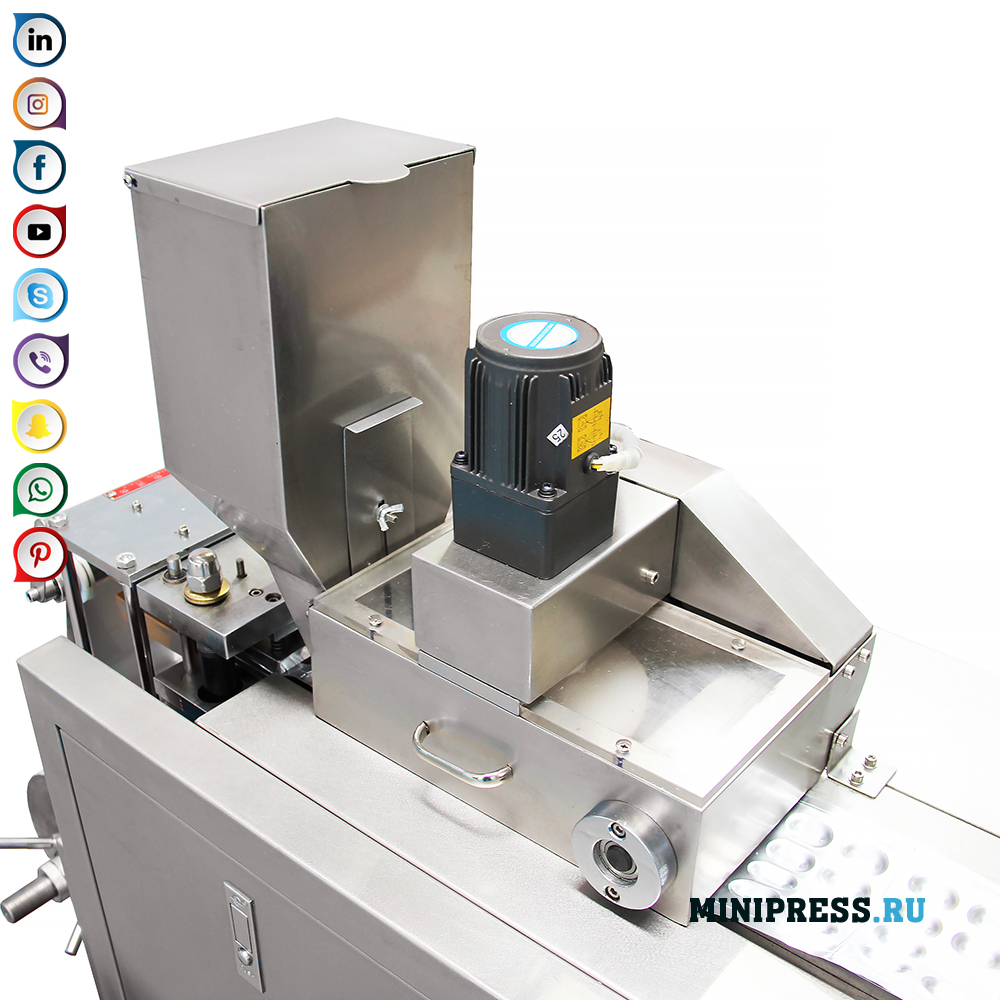 Equip per envasar comprimits i càpsules de gelatina en butllofes d'alumini