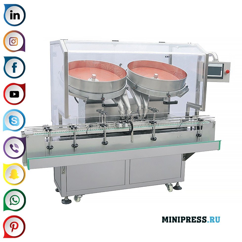 Maskine med to roterende skiver til tælling og påfyldning af tabletter og gelatinekapsler