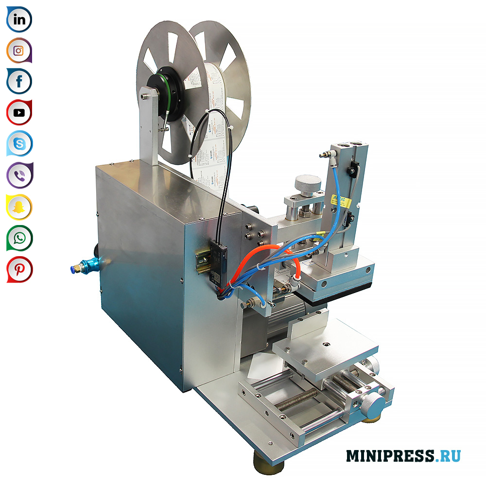 薬箱に粘着ラベルを貼り付ける装置