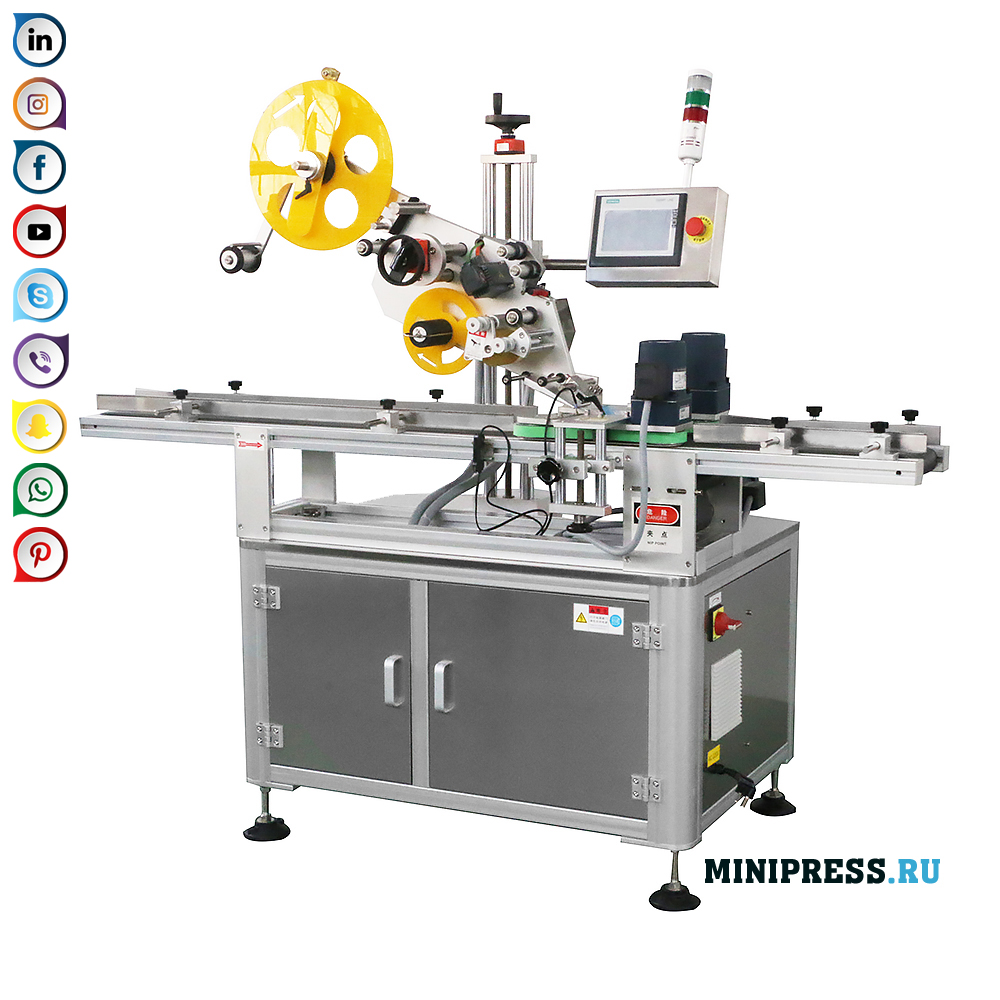 뚜껑 또는 상자 위에 라벨 부착기