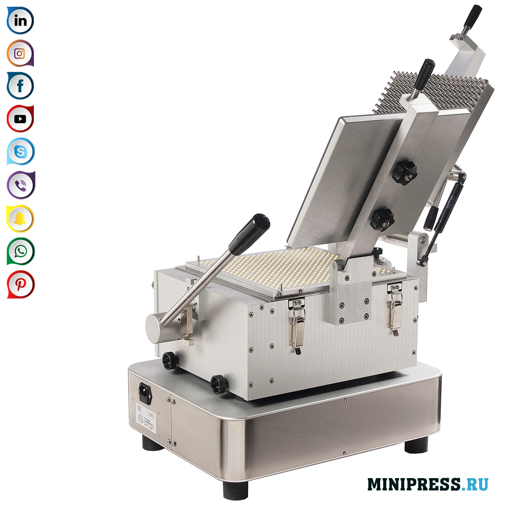 Pusiau automatinė miltelių kapsulė kietose želatinos kapsulėse