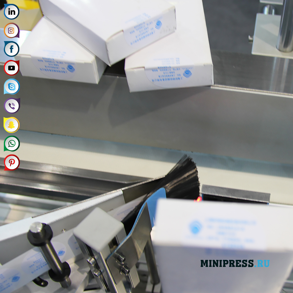 Automatisk etikettklistermaskin