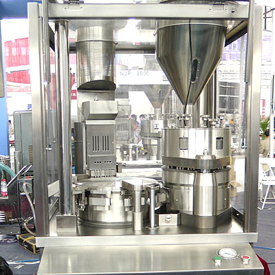 Cápsula automática máquina de llenado www.Minipress.ru